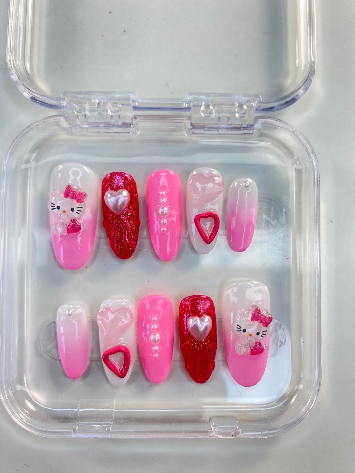 Hello Kitty roze glitterhartslag